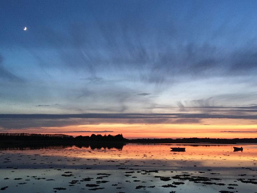 Foto af solnedgang i flotte farver over Holbæk Fjord