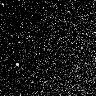Asteroiden YU55 (den hvide streg) fanget af DMI's jordskinteleskop på Hawaii.