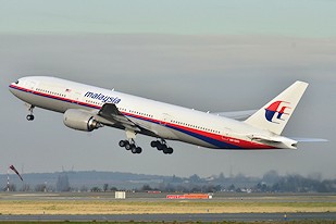 Det forulykkede fly fra Malaysia Airlines flight MH370 fotograferet i 2011. Foto Laurent Errera, L'Union, France.