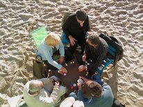 Familie på stranden Familie på stranden